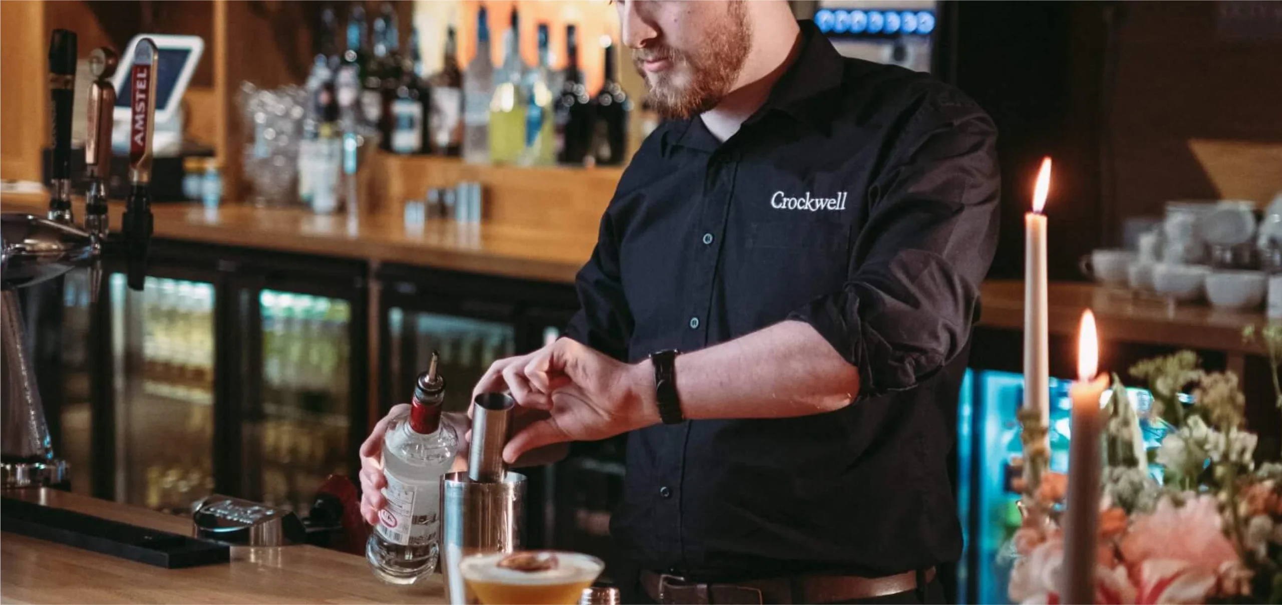 Bartender mixing a cocktail for the guest