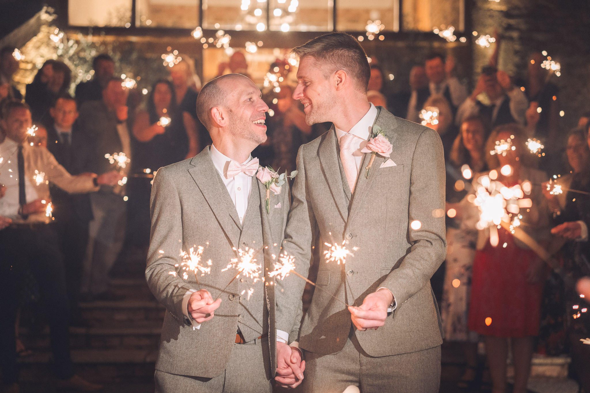 Kris & Simon holding sparkling stick